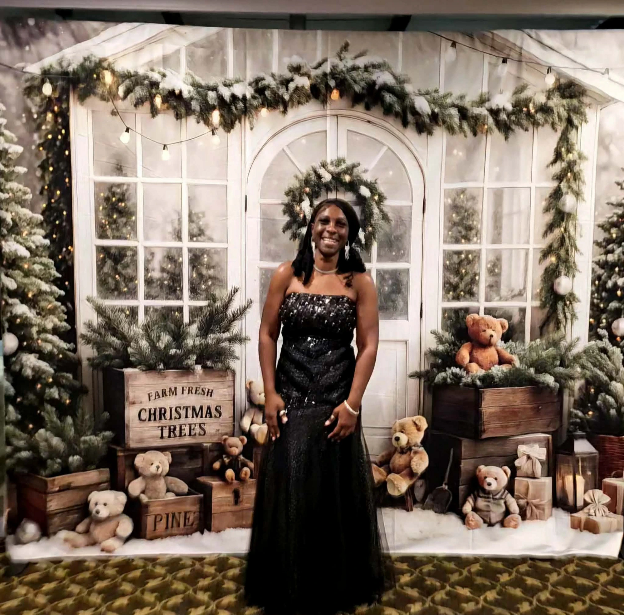 A guest in a sequin gown among the bear display